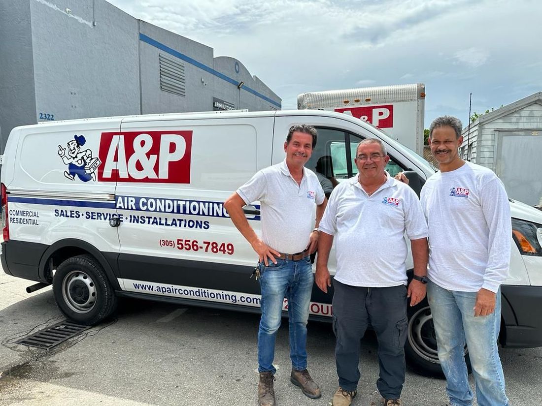 Carlos Simon, Elio Pichardo and Rudy Cornielis — 20+ years with A&P Air Conditioning
