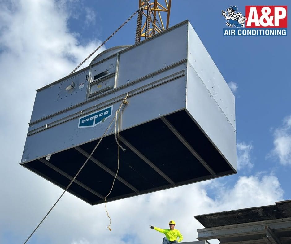 A&P craning a cooling tower into place on a South Florida jobsite