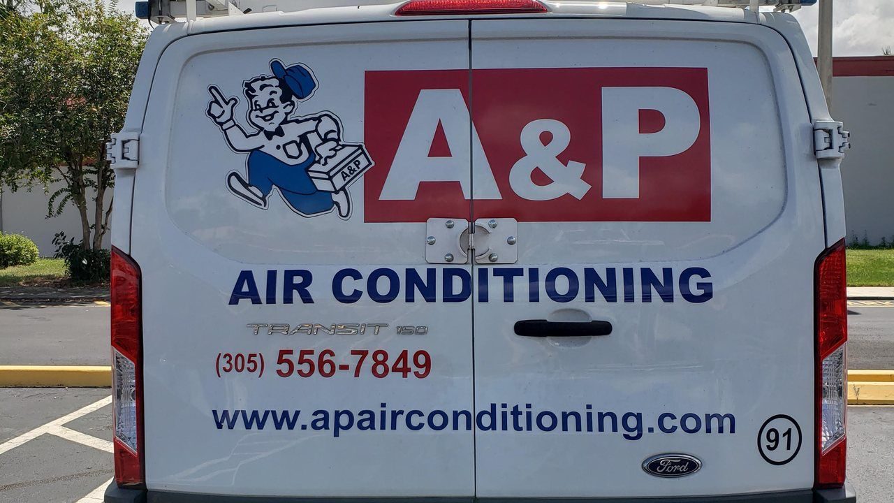 A&P Air Conditioning Transit van with its 24-hour service phone number