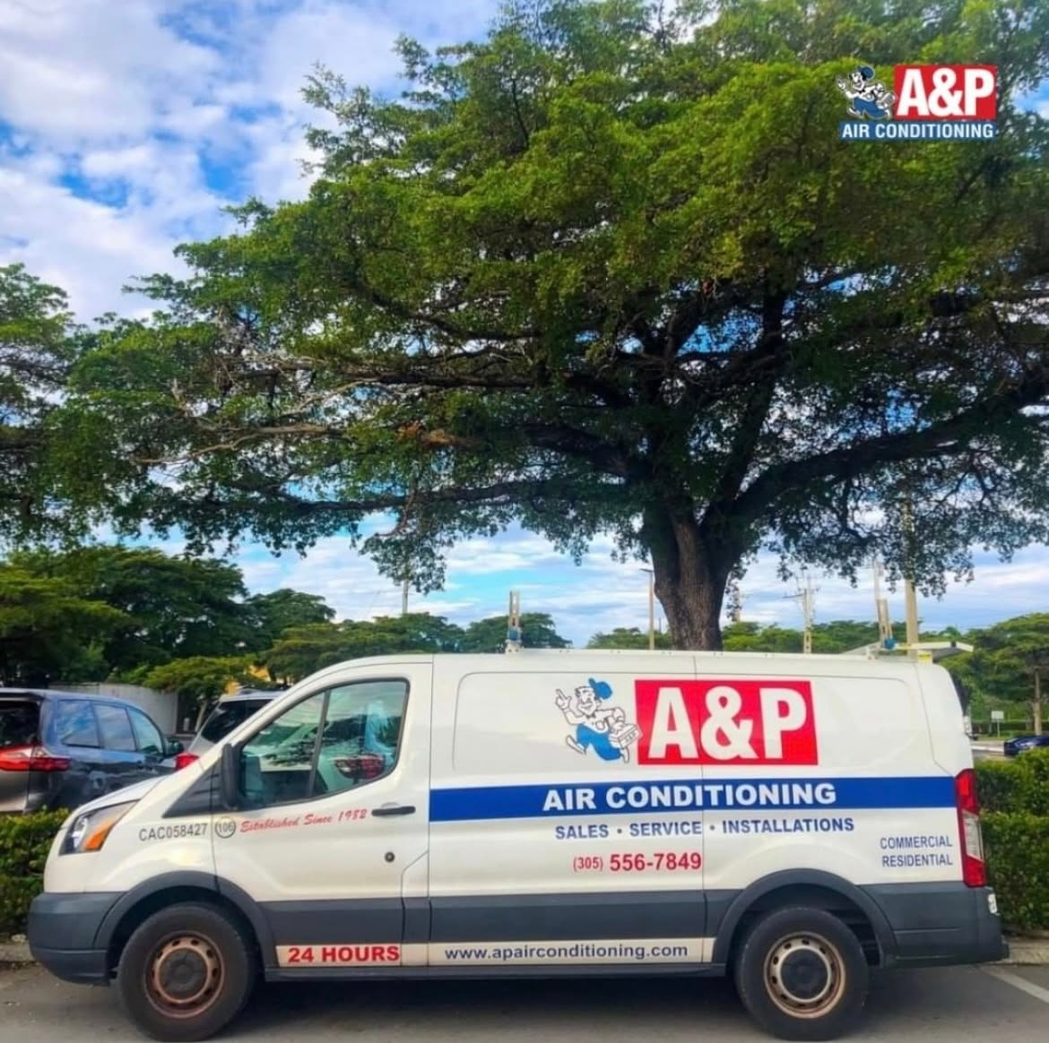 A&P Air Conditioning van parked under a South Florida oak